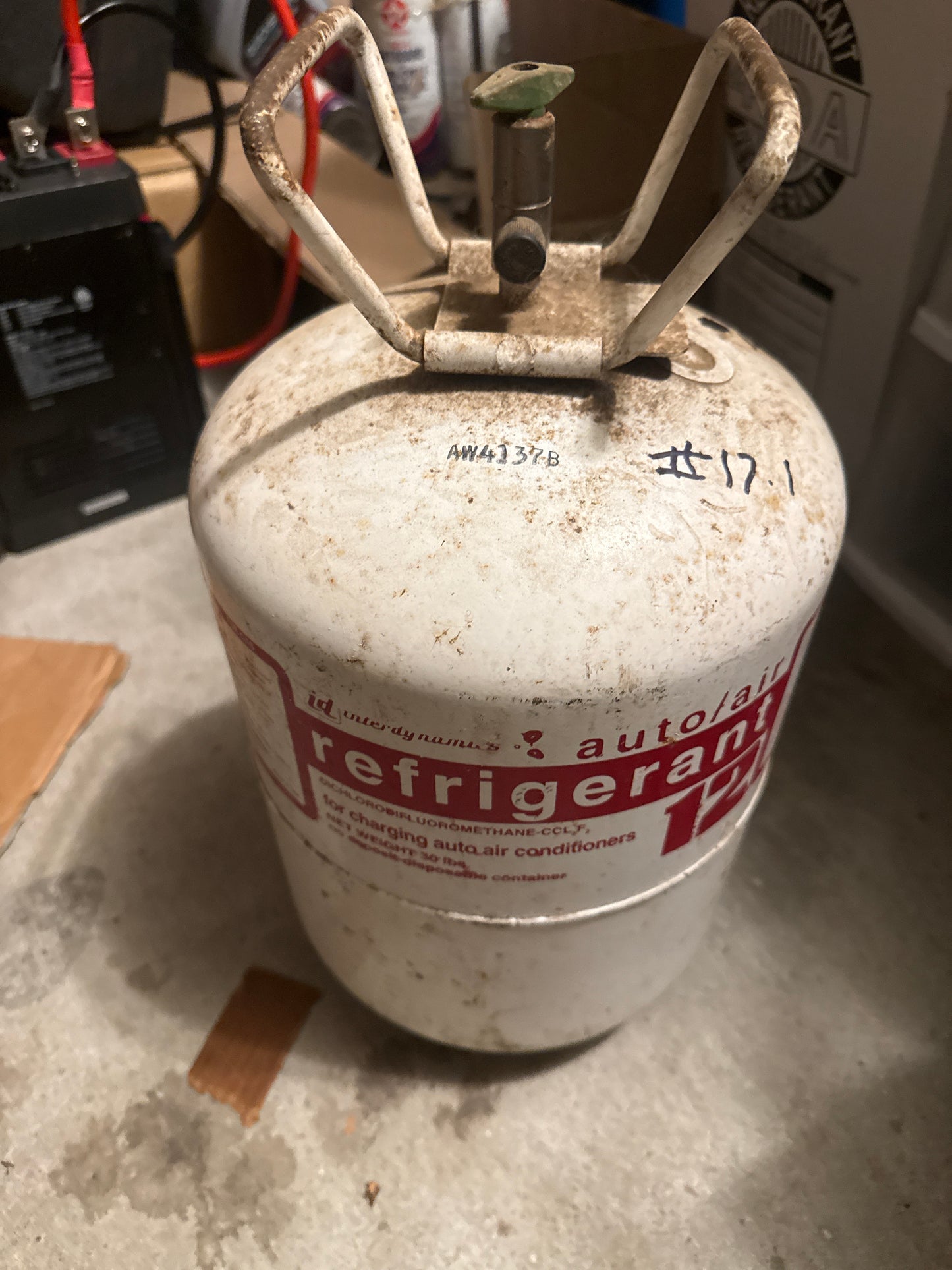 11lbs r-12 refrigerant inside jug freon